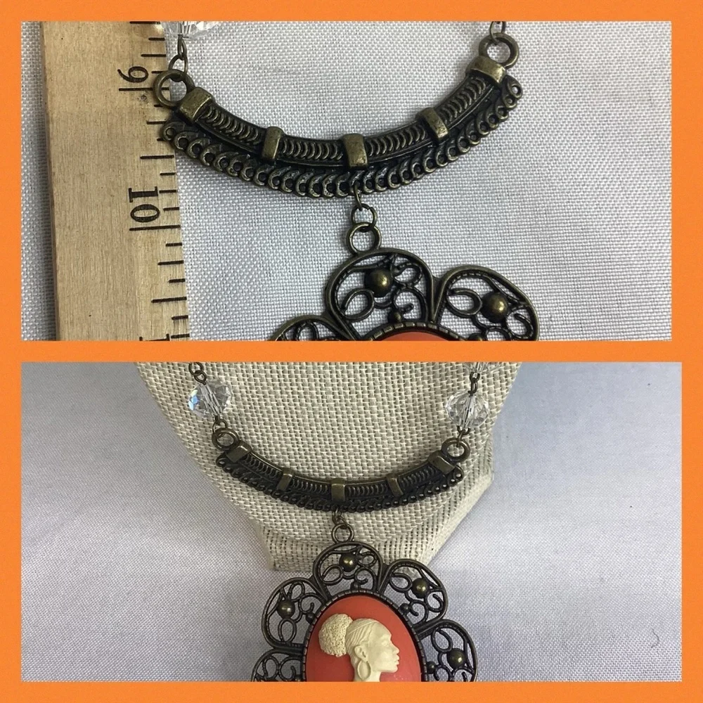Orange and bronze cameo necklace.